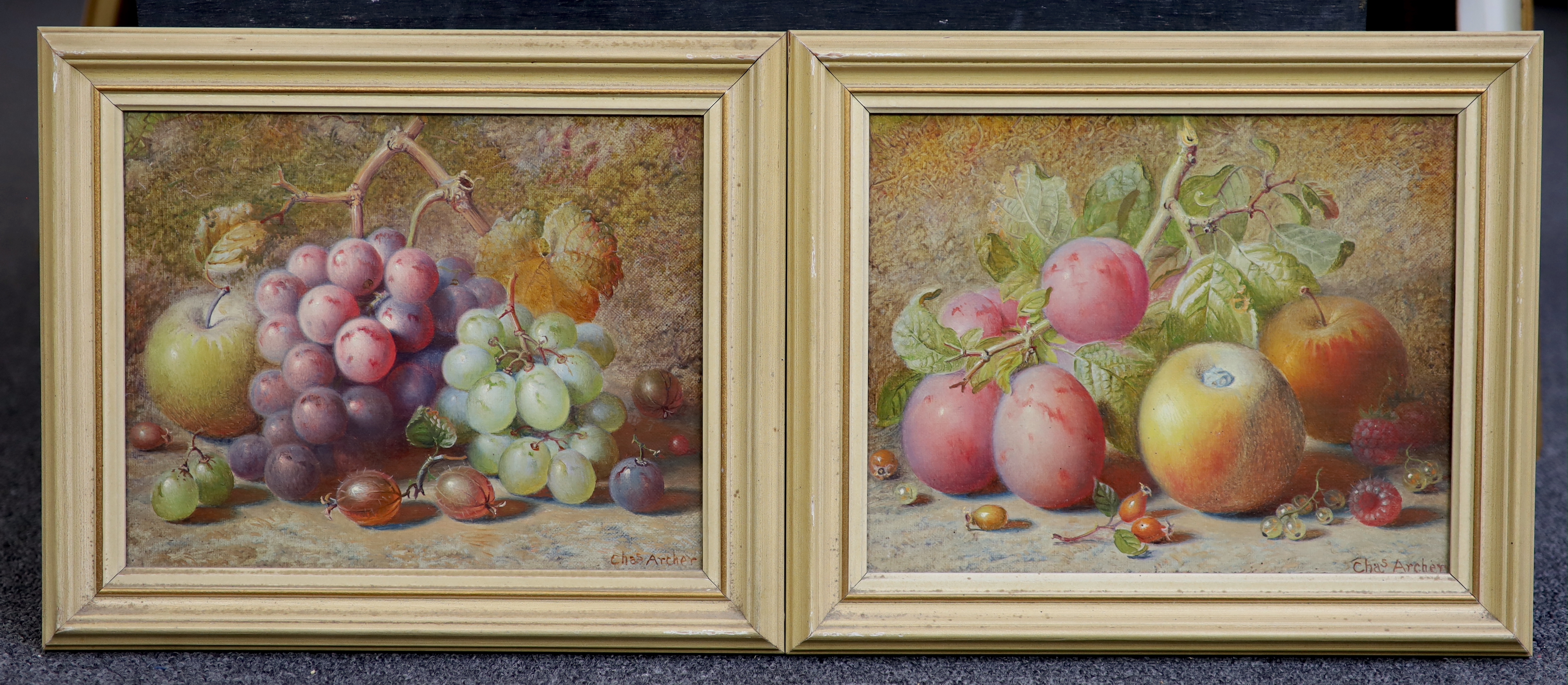 Charles Archer (British, 1855-1931), Still lifes of plums, apples, rosehips, white currants and a raspberry, and of apple, grapes and gooseberries, pair of oils on canvas board, 19.5 x 24.5cm